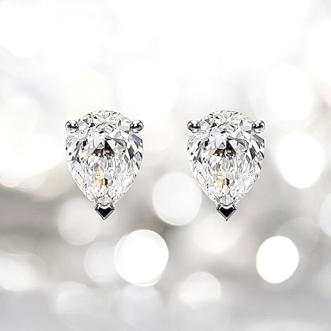 3 Carats Pear Diamond Studs in Platinum